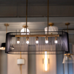 Люстра подвесная овальной формы с металлическим решетчатым абажуром матово-черного цвета и 5 лампами Kichler варинант исполнения - 7 | Loft Concept в Саратове